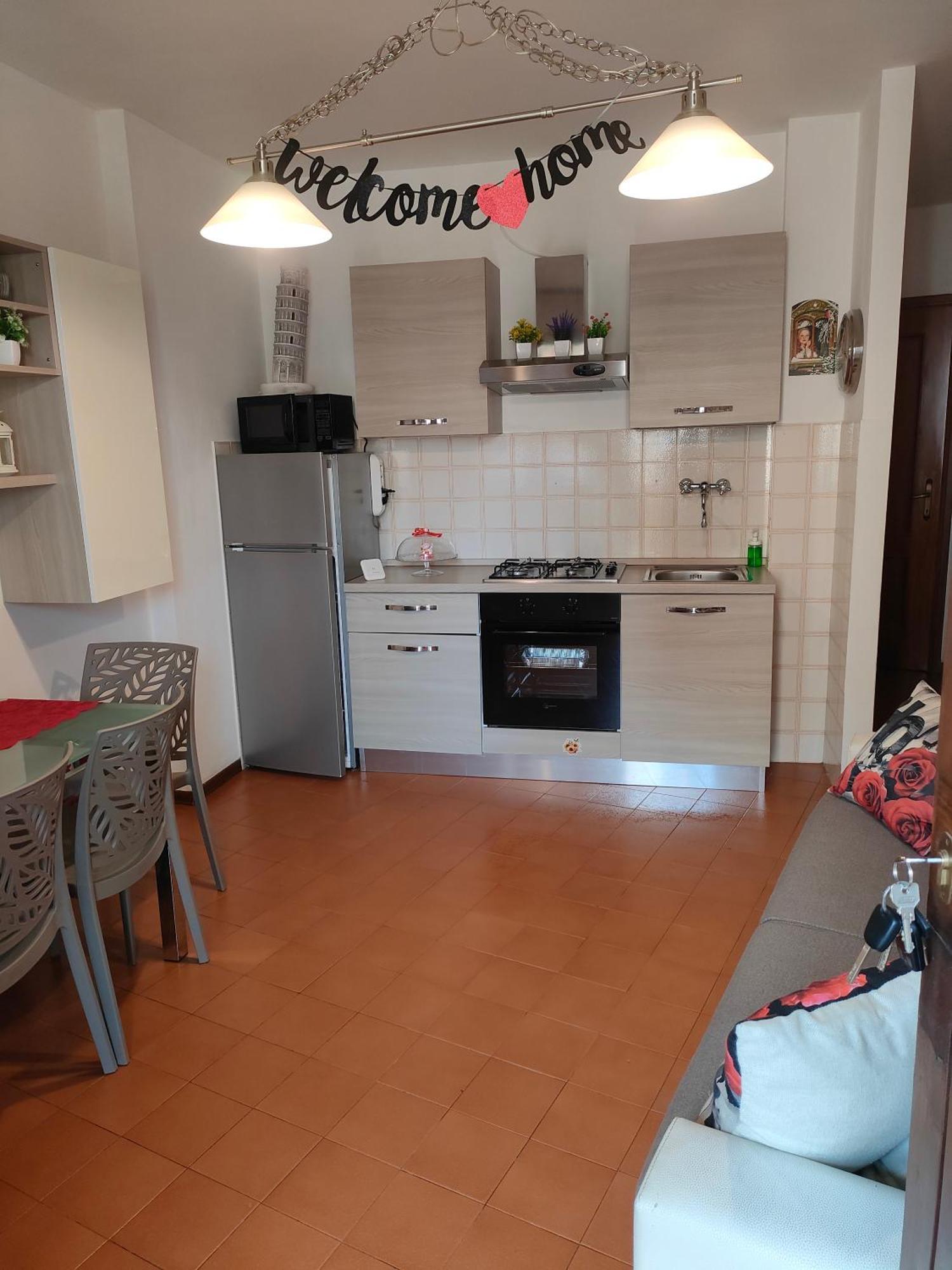 Benvenuti A Casa Apartment Pisa Bagian luar foto
